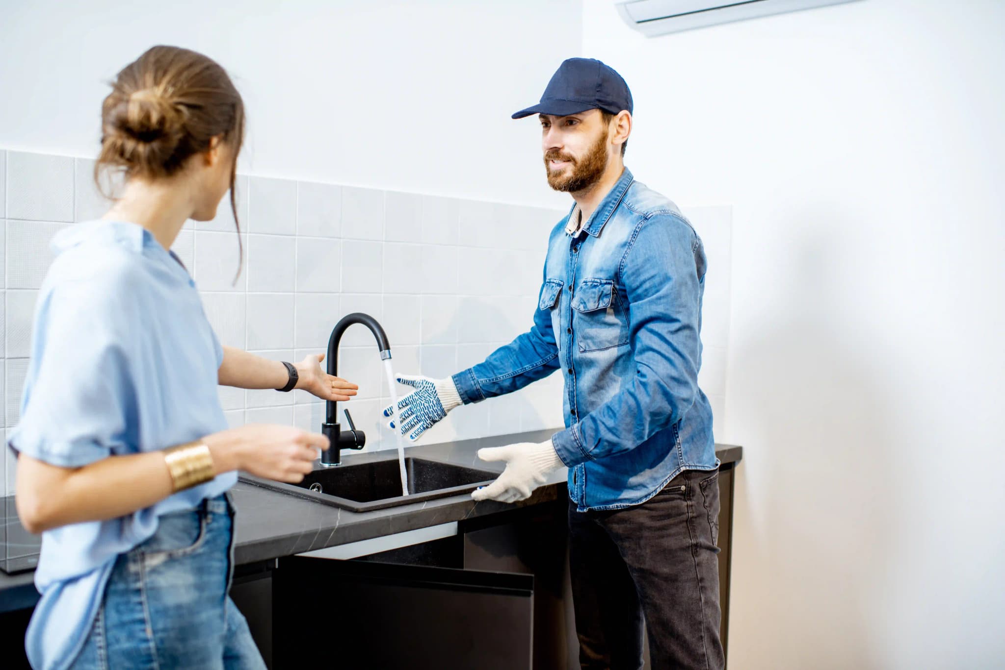 handy-man-with-woman-on-the-kitchen